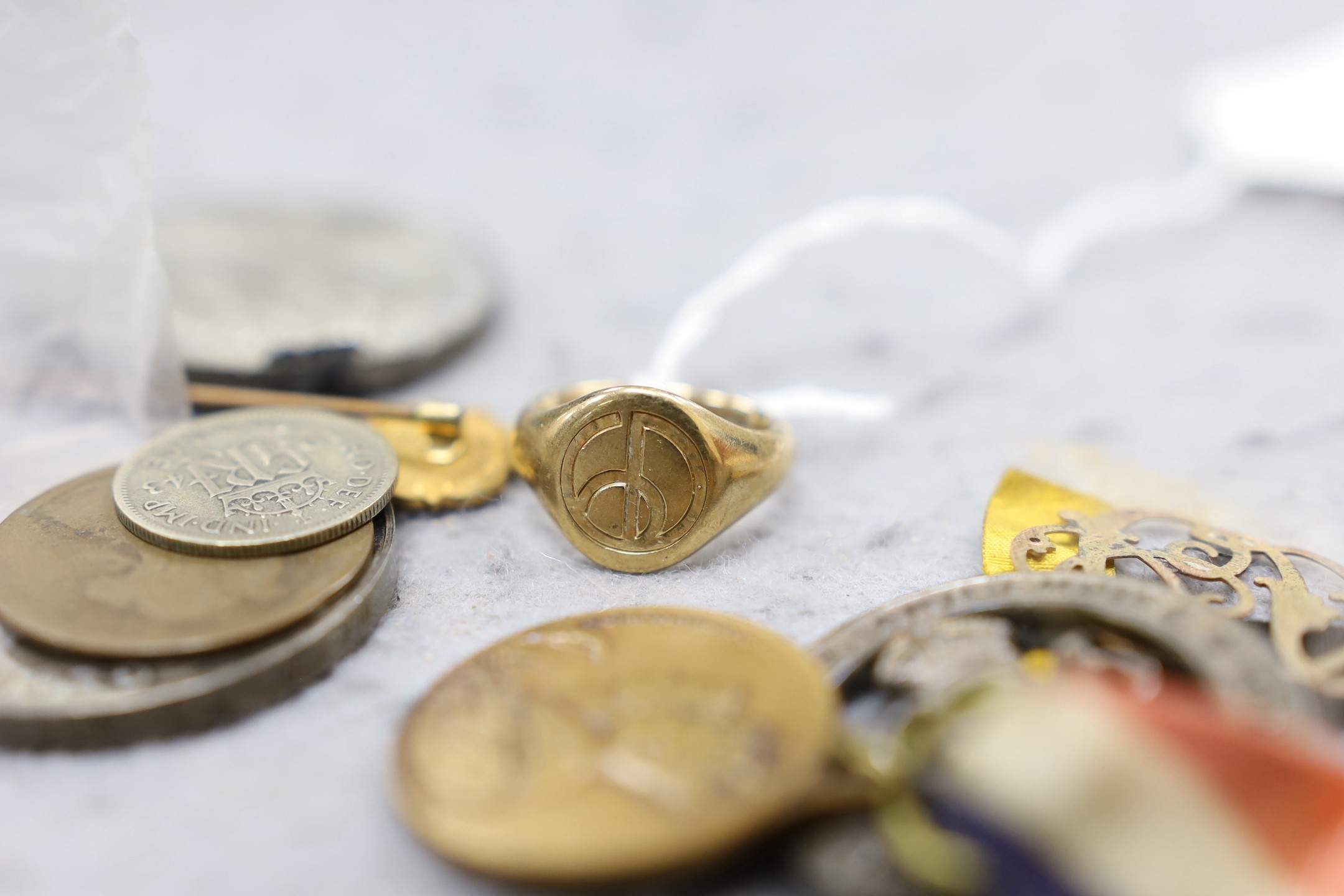 A Great War group of two medals, sundry medallions and coins and a 9ct gold signet ring.